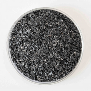 How is anthracite filter material used to treat wastewater?